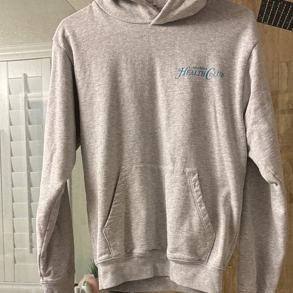 Sporty & Rich Light Gray Hoodie with Blue Logo